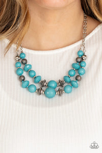 Bold yet whimsical, Blue Tint beads alternate with silver beads etched in a linear pattern along two strands for a vibrant statement below the collar. Features an adjustable clasp closure.