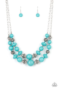 Bold yet whimsical, Blue Tint beads alternate with silver beads etched in a linear pattern along two strands for a vibrant statement below the collar. Features an adjustable clasp closure.