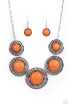 Load image into Gallery viewer, Earthy orange stones, pressed into round antiqued silver frames featuring dot and interlinking loop motifs, create a dramatically rustic statement as they link across the collar. Features an adjustable clasp closure.
