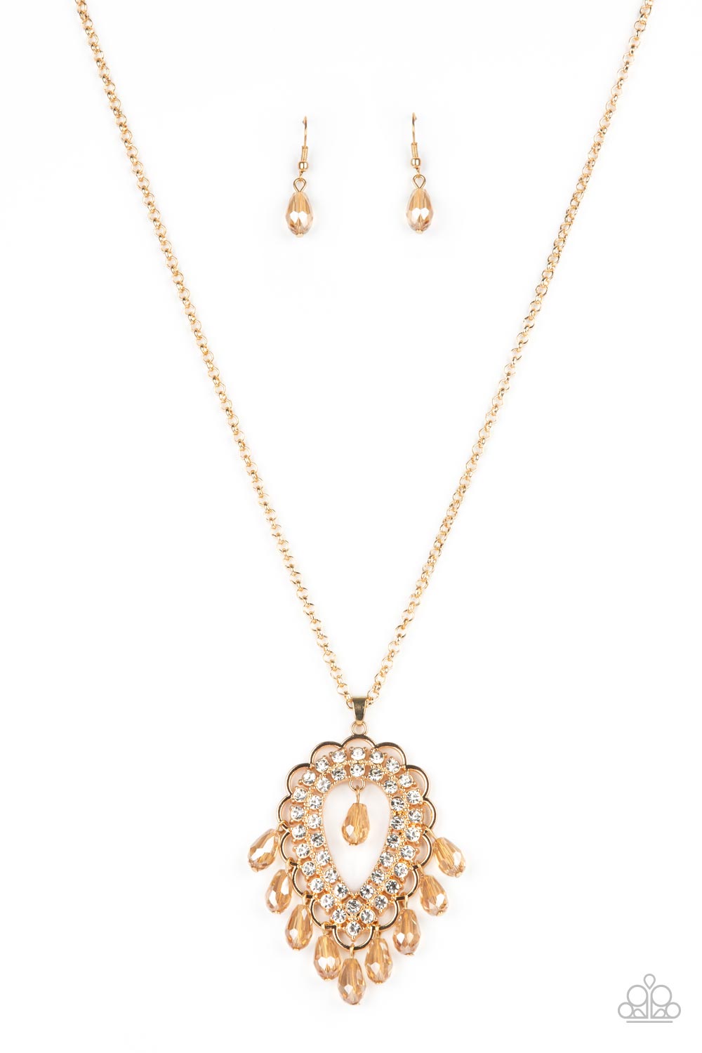 An oversized scalloped teardrop frame, tipped on its point, encases rows of sparkling white rhinestones in its lustrous gold fittings. Shimmery faceted champagne teardrop beads dangle daintily from the scalloped frame for an exquisitely eye-catching pendant at the end of a lengthened gold chain.  Features an adjustable clasp closure. 