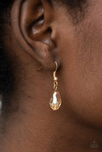 Load image into Gallery viewer, An oversized scalloped teardrop frame, tipped on its point, encases rows of sparkling white rhinestones in its lustrous gold fittings. Shimmery faceted champagne teardrop beads dangle daintily from the scalloped frame for an exquisitely eye-catching pendant at the end of a lengthened gold chain.  Features an adjustable clasp closure. 
