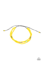 Load image into Gallery viewer, Two strands of dainty Illuminating seed beads, highlighted with a strand of brightly colored beads, form a simple accent around the wrist. Features an adjustable sliding knot closure.
