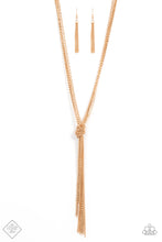 Load image into Gallery viewer, Strands of long glistening gold chains in round, delicate, and classic styles are pulled together in a sassy knot creating a show-stopping fringe tassel and a flirty finish. Features an adjustable clasp closure.  Sold as one individual necklace. Includes one pair of matching earrings.  Fashion Fix New Kit
