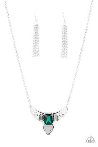 Pairs of faceted silver beads and glassy white emerald cut gems flank an oversized emerald cut green gem atop an antiqued silver half moon frame. A smoky triangular cut gem adorns the bottom of the pendant, creating a twinkly talisman at the bottom of a classic silver chain. Features an adjustable clasp closure.