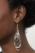 Load image into Gallery viewer, Featuring a hammered high sheen finish, flat silver and gunmetal ovals cascade from the ear, creating a flattering tassel. Earring attaches to a standard fishhook fitting.
