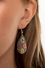 Load image into Gallery viewer, Dainty green, pink, purple, and yellow flowers are encased in a glassy teardrop, creating a whimsical frame. Earring attaches to a standard fishhook fitting.
