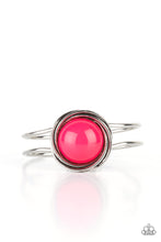 Load image into Gallery viewer, An oversized Raspberry Sorbet bead is pressed into the center of overlapping silver rings that coalesce into a dizzying centerpiece atop an airy silver bangle-like cuff, creating a bold pop of color atop the wrist. Features a hinged closure.
