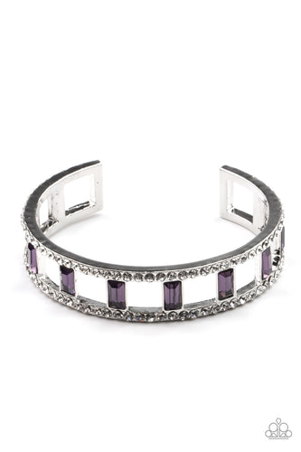 Bands of glittery white rhinestones overlaid on silver frames create an airy channel-like framework. Elegant baguette style cut purple gems, connected to the glittery framework, circle around the wrist for a romantically decadent cuff bracelet.