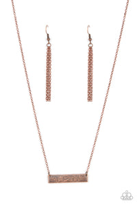 The word "Family," is inscribed between symbolic life lines on a rectangular copper plate creating an affectionate keepsake on a dainty copper chain below the collar. Features an adjustable clasp closure.