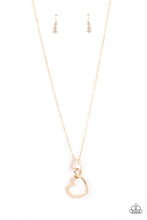 Load image into Gallery viewer, A gold heart engraved with the word &quot;Grandma,&quot; dangles from two smaller hearts at the bottom of a lengthened shimmery gold chain. The first heart is accented with sparkly white rhinestones creating an affectionately sentimental pendant. Features an adjustable clasp closure. 
