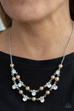 Load image into Gallery viewer, A bubbly collection of brown pearls and glassy white rhinestones delicately connect into two timeless rows below the collar, creating a stunning statement piece. Features an adjustable clasp closure. 
