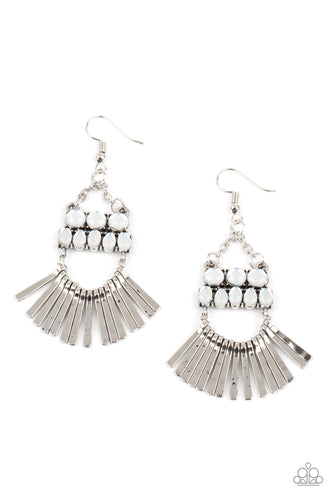 A row of delicately hammered silver rods fans out along a dainty silver wire that attaches to the bottom of stacked rows of opalescent white beads. The mismatched rows of dewy beads swing from the bottom of dainty silver chains, coalescing into an ethereally rustic chandelier. Earring attaches to a standard fishhook fitting