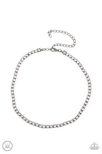 A strand of brilliant white rhinestones set in classic gunmetal fittings creates a stunningly radiant display across the collar. Features an adjustable clasp closure.