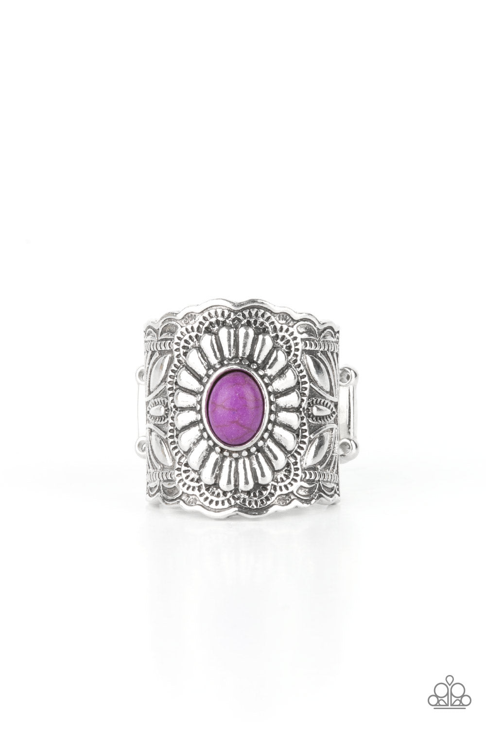 An exquisitely ornate silver band featuring engraved floral motifs is punctuated by a bright purple oval stone creating an elegant centerpiece atop the finger. Features a stretchy band for a flexible fit. 
