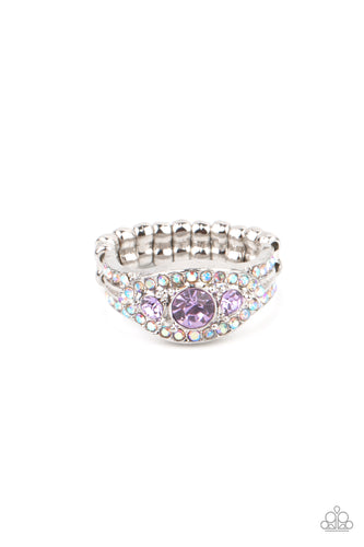 A trio of brilliant Amethyst Orchid rhinestones are set inside a glittering rhinestone encrusted frame creating a divinely heavenly essence atop the finger. Features a dainty stretchy band for a flexible fit.