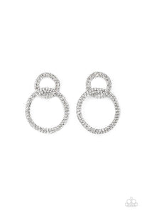Rows of sparkly white rhinestones encircle into two interconnected hoops, creating a jaw-dropping lure. Earring attaches to a standard post fitting.  Sold as one pair of post earrings.