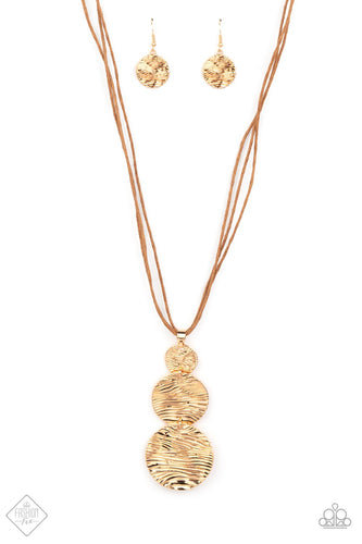 Three shimmery gold discs featuring a wavy pattern flowing across the front, link together in graduating sizes at the end of a lengthened brown cord for an alluring appeal. Features an adjustable clasp closure.  Sold as one individual necklace. Includes one pair of matching earrings.