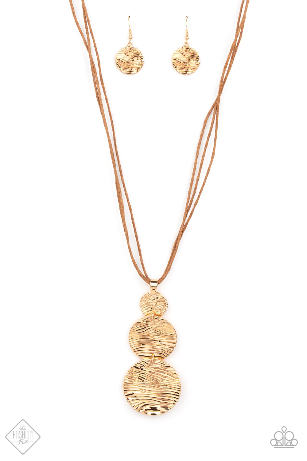 Three shimmery gold discs featuring a wavy pattern flowing across the front, link together in graduating sizes at the end of a lengthened brown cord for an alluring appeal. Features an adjustable clasp closure.  Sold as one individual necklace. Includes one pair of matching earrings.