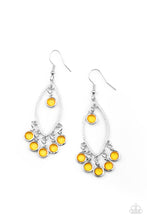 Load image into Gallery viewer, Glassy golden yellow gems dangle from the top and bottom of a textured silver marquise frame, creating a glamorous fringe. Earring attaches to a standard fishhook fitting.
