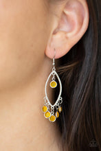 Load image into Gallery viewer, Glassy golden yellow gems dangle from the top and bottom of a textured silver marquise frame, creating a glamorous fringe. Earring attaches to a standard fishhook fitting.
