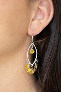 Glassy golden yellow gems dangle from the top and bottom of a textured silver marquise frame, creating a glamorous fringe. Earring attaches to a standard fishhook fitting.