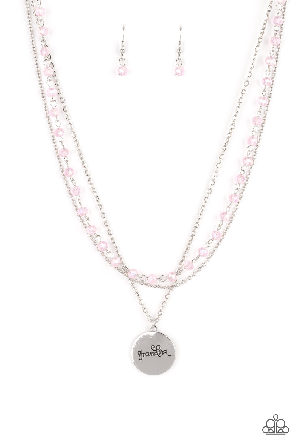 Infused with a strand of iridescent pink crystal-like beads, two dainty rows of mismatched silver chains delicately layer below the collar. Stamped in the word, 