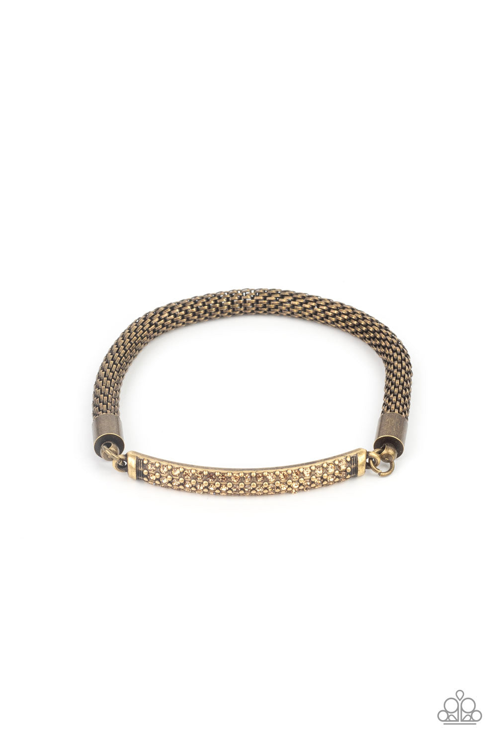 Threaded along a stretchy band, a gritty strand of rounded brass mesh chain links with a smoldering brass plate encrusted in rows of dainty topaz rhinestones, creating an edgy shimmer around the wrist.