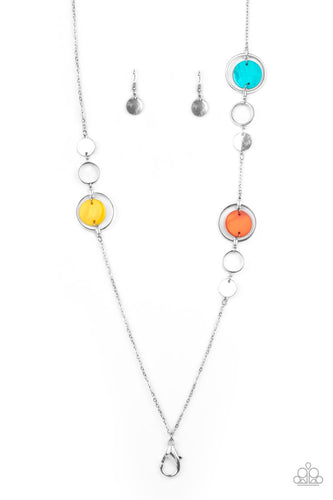 A shimmery collection of dainty silver discs, shiny silver rings, and blue, yellow, and orange shell-like frames delicately link across the chest, creating a summery display. A lobster clasp hangs from the bottom of the design to allow a name badge or other item to be attached. Features an adjustable clasp closure. 