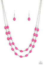 Load image into Gallery viewer, Encased in studded silver frames, two rows of oval pink stones delicately connect below the collar for a vivacious pop of color. Features an adjustable clasp closure.
