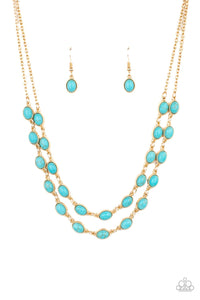 Encased in studded gold frames, two rows of oval turquoise stones delicately connect below the collar for a seasonal flair. Features an adjustable clasp closure. 