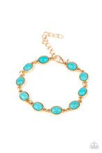 Load image into Gallery viewer, Encased in studded gold frames, oval turquoise stones delicately connect around the wrist for a seasonal flair. Features an adjustable clasp closure. 
