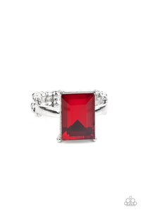 A fiery emerald cut gem is nestled inside a pronged silver frame atop a dainty silver band, creating a sparkly statement atop the finger. Features a dainty stretchy band for a flexible fit.