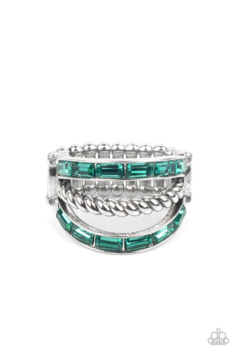 Two bands of emerald cut green rhinestones flank a twisted silver bar across the finger, creating an edgy layered centerpiece. Features a stretchy band for a flexible fit.