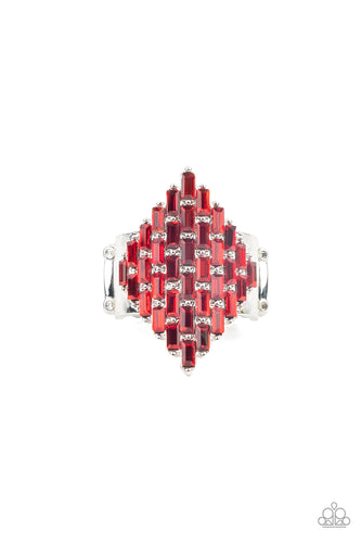 Fiery red emerald cut rhinestones are encrusted across the front of a studded silver frame, creating a sparkly honeycomb shaped centerpiece. Features a stretchy band for a flexible fit.