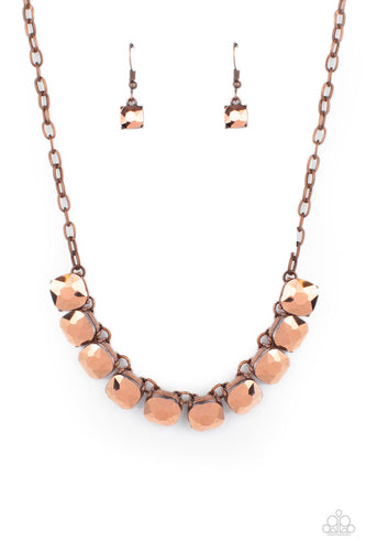 A succession of gleaming radiant-cut copper aurum gems attaches to a copper chain and falls below the collar for an edgy show-stopping display. Features an adjustable clasp closure.