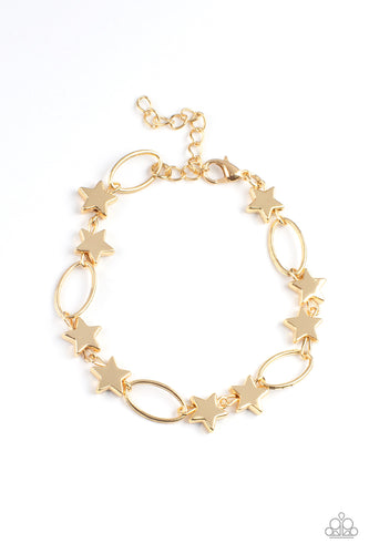 Dainty gold stars and airy gold ovals delicately link around the wrist, creating a stellar 4th of July display. Features an adjustable clasp closure.