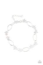 Load image into Gallery viewer, Dainty silver stars and airy silver ovals delicately link around the wrist, creating a stellar 4th of July display. Features an adjustable clasp closure.
