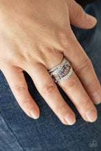 Load image into Gallery viewer, Mismatched bands of dainty silver studs, glassy white rhinestones, and marquise cut purple rhinestones delicately weave across the finger, creating an elegantly layered centerpiece. Features a stretchy band for a flexible fit.
