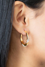 Load image into Gallery viewer, Ribbons of white rhinestones wrap around a dainty gold hoop that has been chiseled and twisted, adding extra dimension. Earring attaches to a standard post fitting. Hoop measures approximately 1&quot; in diameter.
