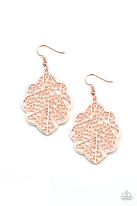 A scalloped rose gold leafy frame is filled with a backdrop of stenciled geometric accents, creating a whimsy seasonal display. Earring attaches to a standard fishhook fitting.