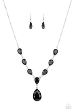 Load image into Gallery viewer, Encased in sleek silver fittings, a chain of faceted black teardrops give way to an oversized black teardrop pendant for an enchanting pop of color below the collar. Features an adjustable clasp closure.
