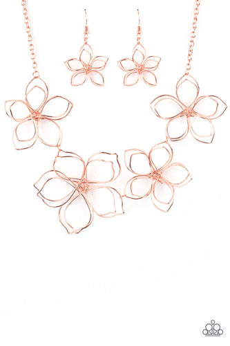 Shiny copper wire delicately twists into oversized blossoms. Varying in size, the airy floral frames delicately link into an asymmetrical display as the layered frames elegantly pop beneath the collar. Features an adjustable clasp closure. 