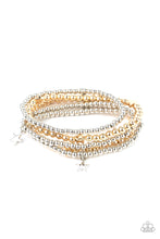 Load image into Gallery viewer, Infused with dainty gold star beads and shiny silver star charms, strands of gold and silver beaded stretchy bands stack across the wrist, creating a patriotic shimmer. 
