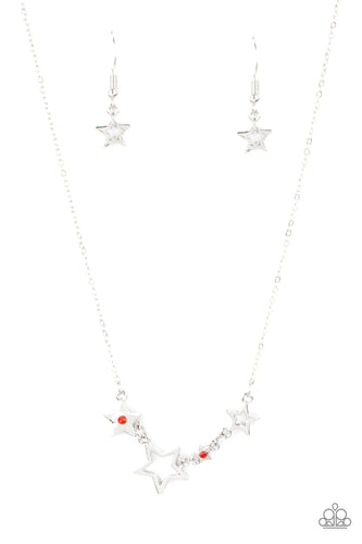 A mismatched collection of airy silver stars and red rhinestone dotted star frames delicately link below the collar, creating a stellar patriotic inspired pendant. Features an adjustable clasp closure.
