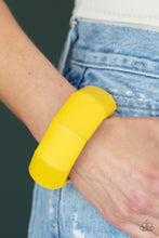 Load image into Gallery viewer, Painted in a sunny yellow finish, chunky geometric wooden beads are threaded along stretchy bands around the wrist for a colorful tropical inspired look. 
