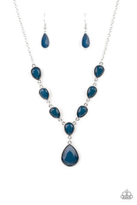 Encased in sleek silver fittings, a chain of faceted blue teardrops gives way to an oversized blue teardrop pendant for an enchanting pop of color below the collar. Features an adjustable clasp closure. 