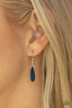 Load image into Gallery viewer, Encased in sleek silver fittings, a chain of faceted blue teardrops gives way to an oversized blue teardrop pendant for an enchanting pop of color below the collar. Features an adjustable clasp closure. 
