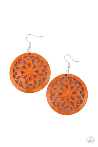 A bold mandala-inspired design is carved out of an oversized orange disc creating an eye-catching statement.  Earring attaches to a standard fishhook fitting.