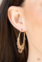 Load image into Gallery viewer, A shiny collection of gold star charms trickles from the bottom of a classic gold hoop, creating a stellar fringe. Earring attaches to a standard post fitting. Hoop measures approximately 1 1/4&quot; in diameter. 
