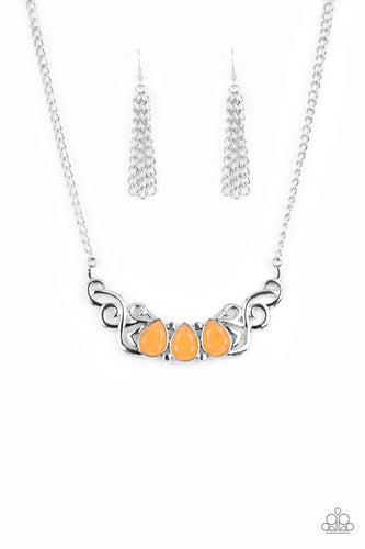 Featuring an opaque iridescence, a row of Marigold teardrop beads are pressed into a studded backdrop of vine-like silver filigree, creating a whimsical centerpiece below the collar. Features an adjustable clasp closure. 